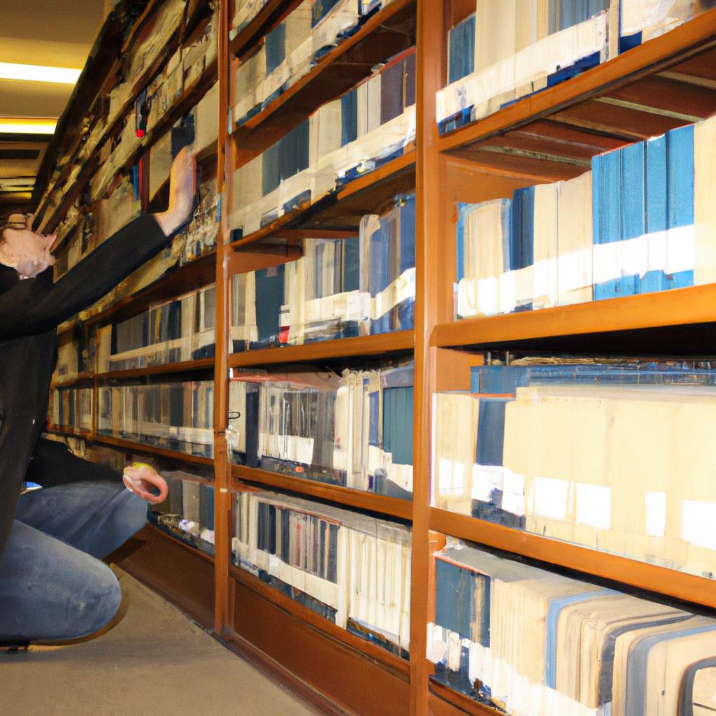 Person researching in library archives